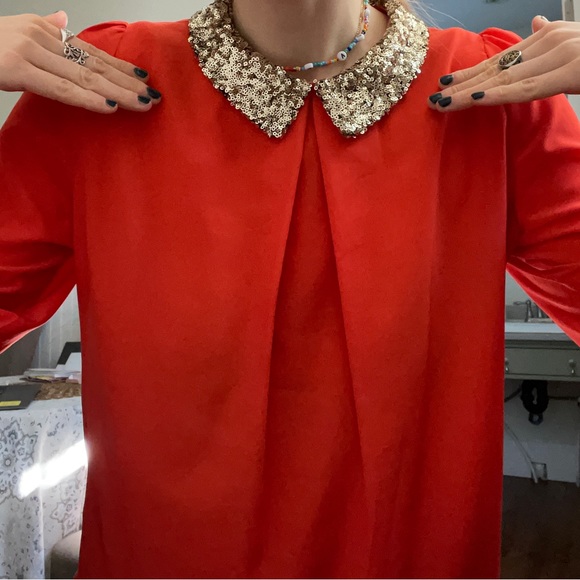 Orange shirt with a sequinned collar - Picture 1 of 3